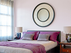 Purple Themed Bedroom With Purple Bed Covers And Circles